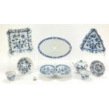 Meissen Blue Onion pattern porcelain to include teapot, drainer, scallop dish, triangular dish, cups