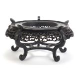 Good Chinese hardwood stand carved with bats and foliage, 16cm high x 30.5cm in diameter : For