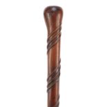 18th century carved hardwood walking stick with inset silver disk, 93cm in length : For Further