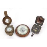 Three military interest compasses, the largest 10cm in diameter : For Further Condition Reports