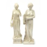 Pair of floor standing classical marble style statues of Grecian maidens, the largest 81cm high :