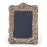 Victorian style easel photo frame embossed with foliage and flowers, London 1990, 13.3cm high :
