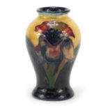William Moorcroft pottery baluster vase hand painted in the freesia pattern, 10.5cm high : For