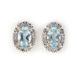 Pair of 9ct gold topaz and diamond earrings, 1cm in length, 1.2g : For Further Condition Reports