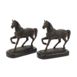 Matched pair of bronzed horses raised on ebonised bases, each 16.5cm high : For Further Condition