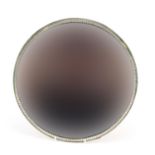 Mirrored glass stand with etched cut out thumb print edge, 35cm in diameter : For Further