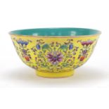 Chinese yellow ground porcelain bowl hand painted in the famille rose palette with blossoming