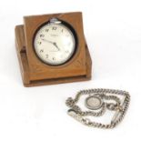 Objects comprising Ingersoll pocket watch, Black Forest watch stand and watch chain : For Further