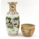 Large Chinese porcelain vase and fish bowl, the vase hand painted with storks amongst trees, the