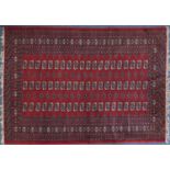 Rectangular Bokhara rug, 186cm x 127cm : For Further Condition Reports Please Visit Our Website,