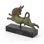 Patinated bronze Byzantine style horse raised on a black slate base, 12cm wide : For Further