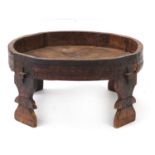 Antique Indian carved hardwood rice table with metal mounts, 33cm high x 68cm in diameter : For