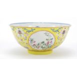 Chinese porcelain yellow ground bowl with blue and white interior, the exterior hand painted in