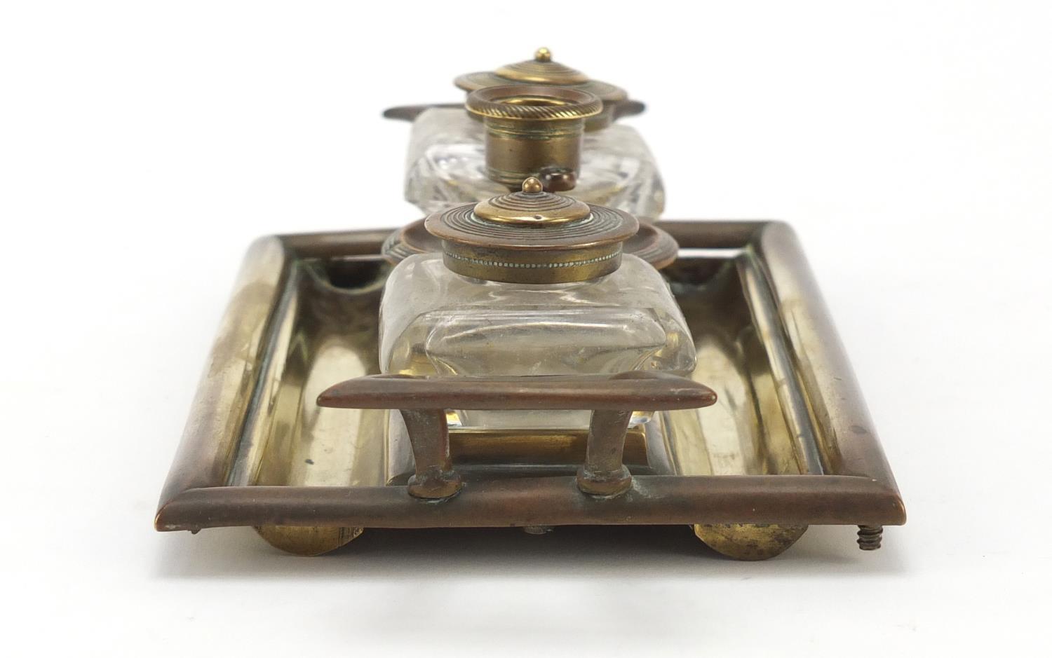 Victorian aesthetic style brass desk stand with two glass inkwells and a chamber stick, 23.5cm - Image 3 of 11