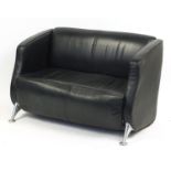 Contemporary black leather two seater settee with chromed legs, 77cm H x 122cm W x 58cm D : For