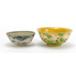 Two Chinese porcelain bowls including a yellow ground example, hand painted with cranes amongst