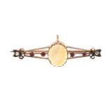 Unmarked gold cabochon opal, diamond and pink stone bar brooch, 5.5cm in length, 3.8g : For