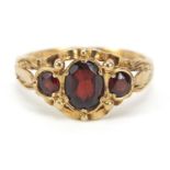 Victorian style 9ct gold garnet three stone ring, size O, 3.2g : For Further Condition Reports