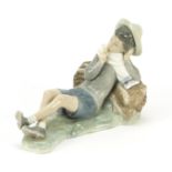 Lladro figure of a boy, 20.5cm wide : For Further Condition Reports Please Visit Our Website,