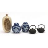 Chinese porcelain and two cast iron teapots, including a pair of blue and white prunus ginger