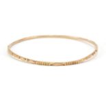 Unmarked gold bangle, (tests as 9ct gold) 6.5cm in diameter, 7.0g : For Further Condition Reports
