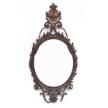 Good World War I interest oak mirror, finely carved with a crest and leaves, incised fait par E