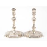 Pair of 18th century design cast silver candlesticks, BM London 1996, 10cm high, 338.8g : For