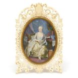 Good 19th century carved ivory easel frame housing an oval portrait miniature hand painted with a