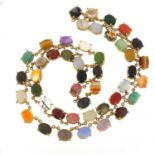 Good 18ct gold necklace set with symmetrical cabochon semi precious stones, including opal, lapis