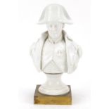 19th century Naples porcelain bust of Napoleon raised on a square gilt brass plinth base, 26.5cm