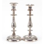 Pair of classical silver plated candlesticks, each 28.5cm high : For Further Condition Reports