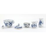 Meissen porcelain comprising oversized cup, milk bowl, sugar bowl, flower vase and two lids, each