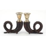 Pair of American Hollywood Regency style patinated bronze ram horn candlesticks, possibly by