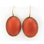 Pair of Dutch gold and coral earrings, impressed oak leaf mark to the pins, 2.5cm in length, 3.