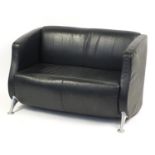 Contemporary black leather two seater settee with chromed legs, 77cm H x 122cm W x 58cm D : For