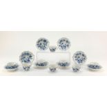 Eight Meissen coffee cups and saucers, hand painted in the Blue Onion pattern, crossed sword marks