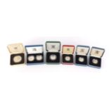 Silver proof coins with cases comprising three one pounds, ten pence two coin set, ten pence and