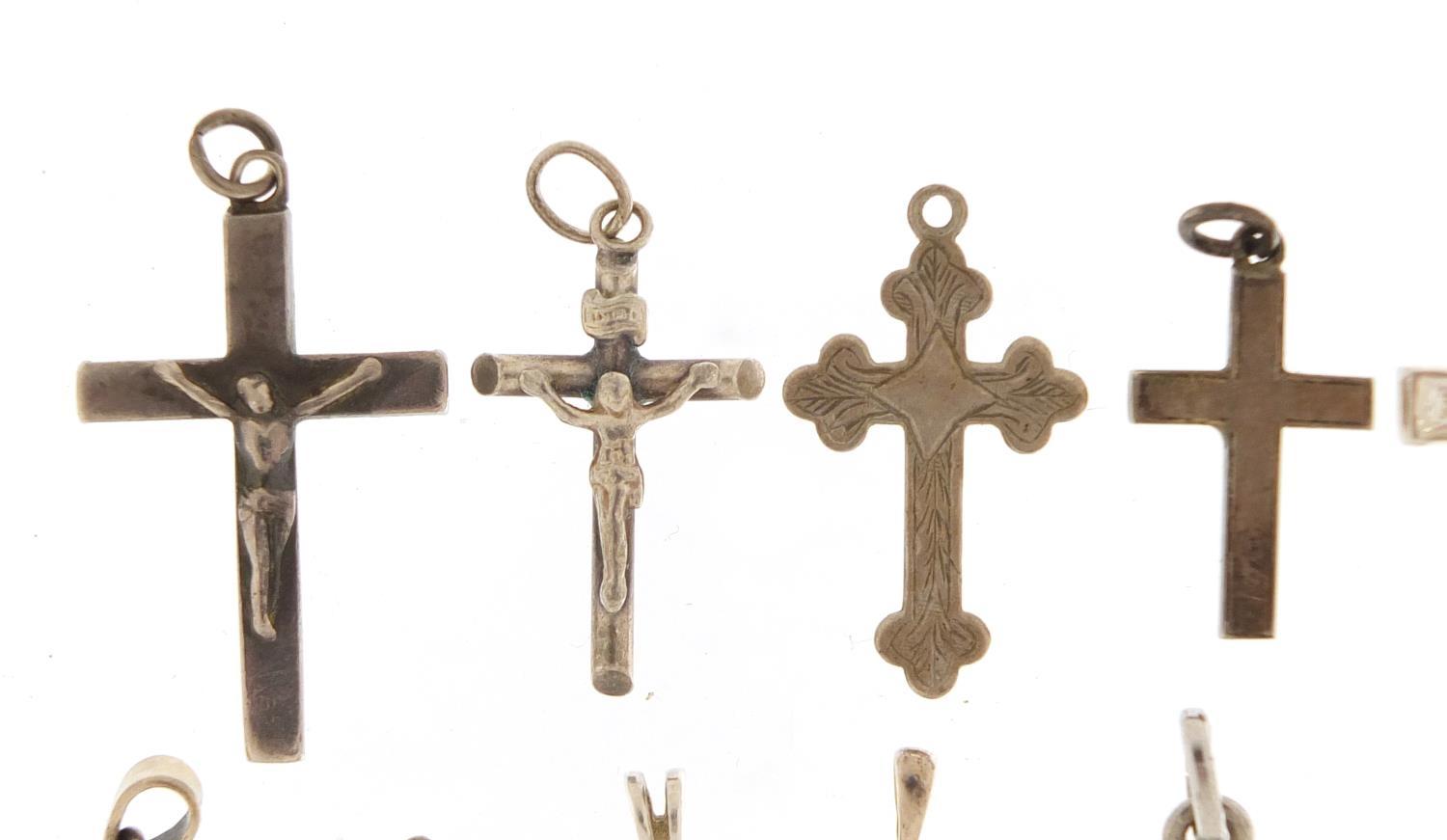 Twenty two silver pendants including crucifixes and love hearts, the largest 5.5cm in length, 39. - Image 2 of 8