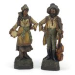 Large pair of Continental cold painted terracotta figures of musicians in the manner of