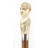 Malacca walking stick with carved ivory phrenology head pommel and silver mount, Thomas Davis,