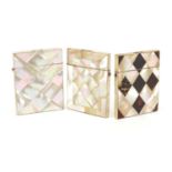 Three Victorian mother of pearl calling card cases including one with tortoiseshell, each