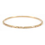 Unmarked gold bangle, (tests as 9ct gold) 6.5cm in diameter, 8.5g : For Further Condition Reports