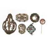 Jewellery including three silver brooches, and a silver enamel pendant, the largest 5.5cm in