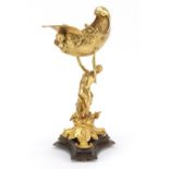 Ornate classical gilt bronze centrepiece in the form of a mermaid holding a shell aloft, 39cm high :