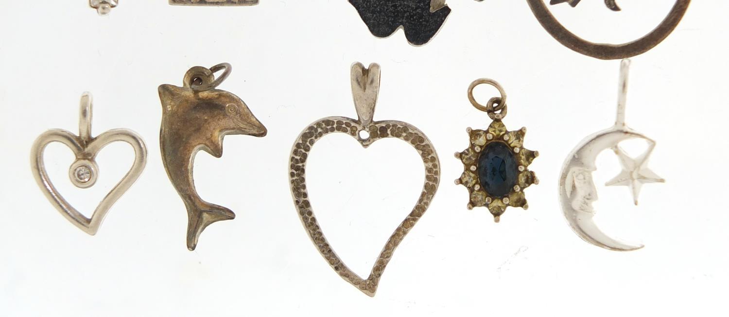 Twenty two silver pendants including crucifixes and love hearts, the largest 5.5cm in length, 39. - Image 6 of 8