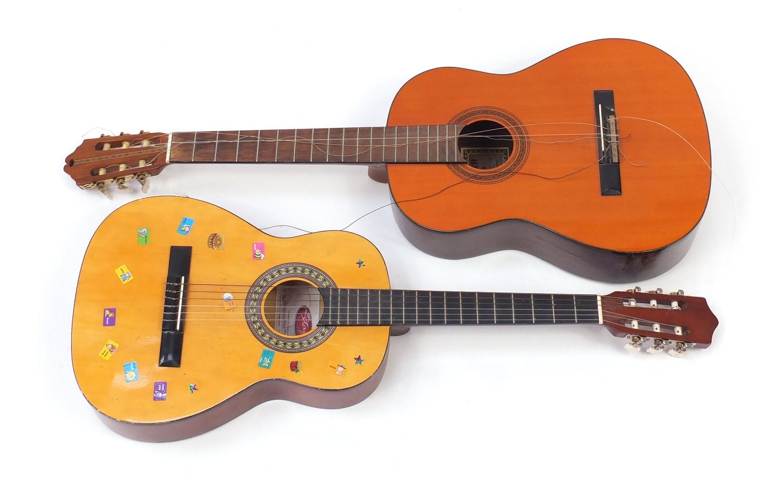 Two wooden acoustic guitars comprising Hohner model LC120 and Stag model C530 : For Further
