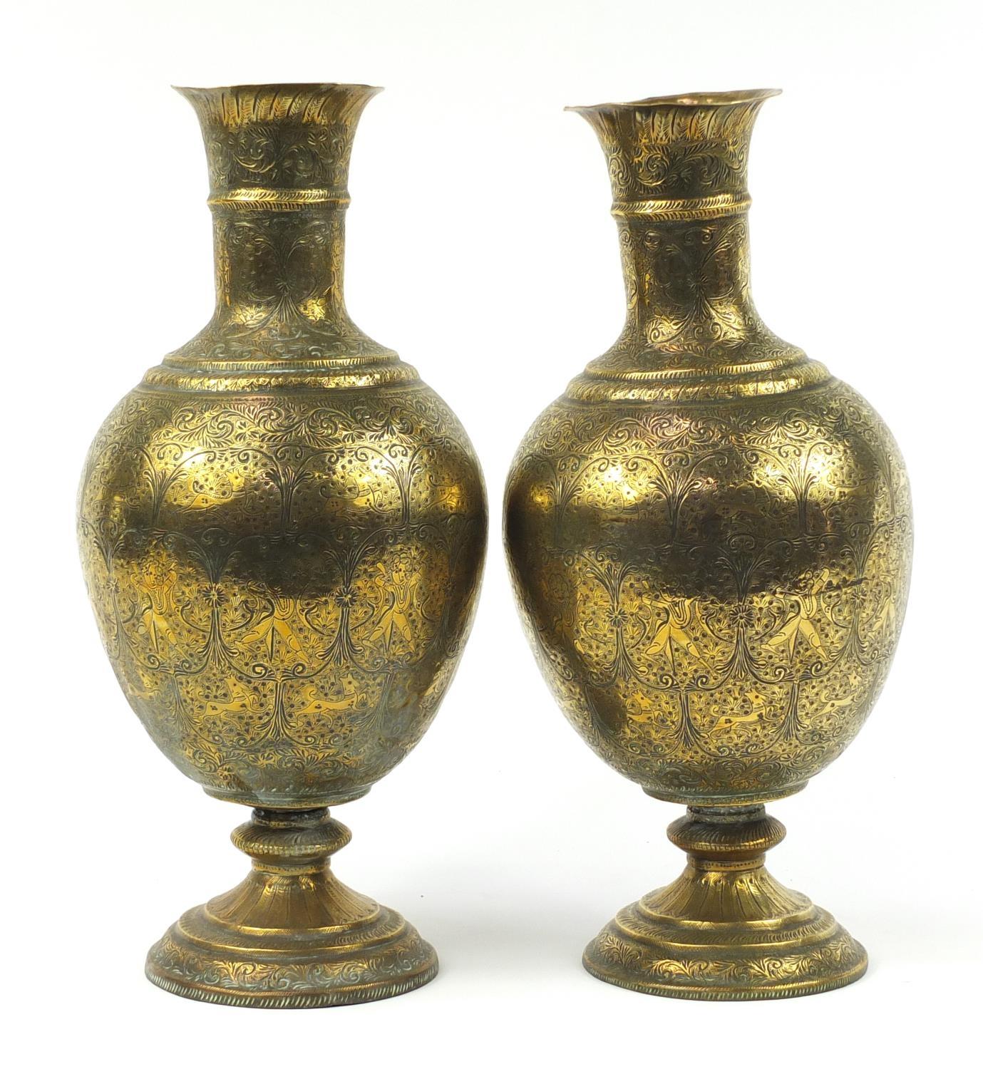 Large pair of Indian brass vases engraved with figures, animals and flowers, each 53cm high : For - Image 2 of 8