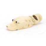 Early 19th century carved ivory dog's head whistle, 5.5cm in length : For Further Condition
