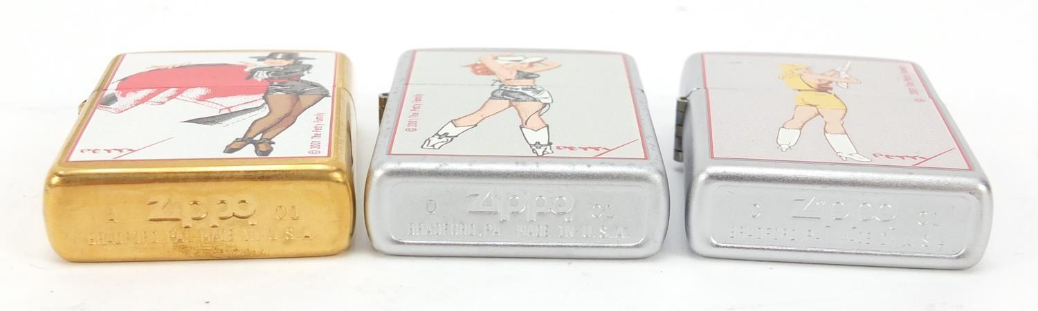 Three Zippo Petty Girl lighters two with cases including one with cardboard slip : For Further - Image 8 of 9