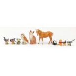 Nine Beswick collectable animals including owl 2026, seated cat 1030, horse, panda and Winnie the
